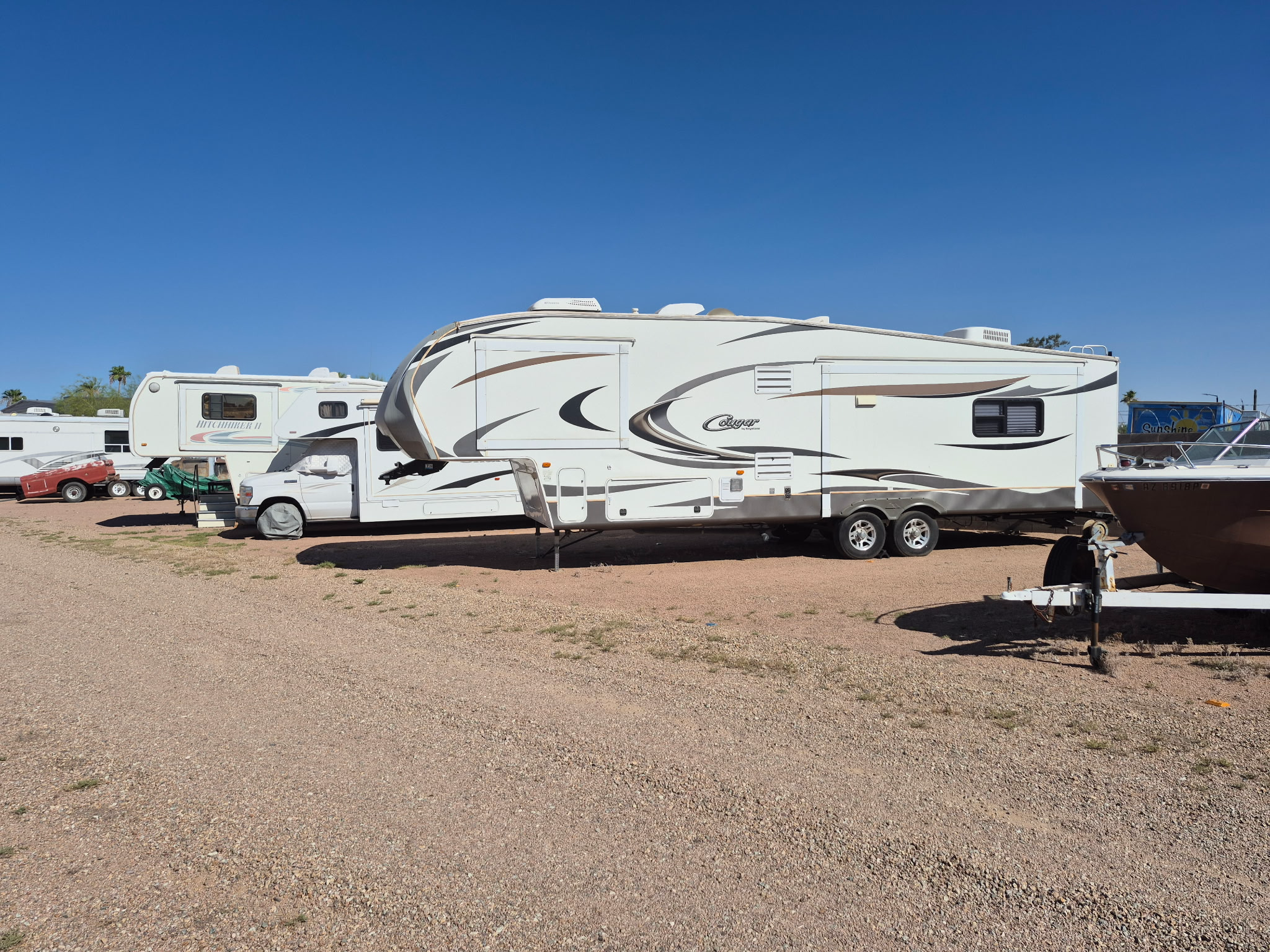 Large fifth-wheel RV stored at the facility